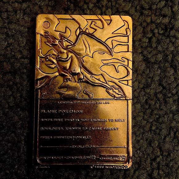 24k gold pokemon card A unique 24k gold Pokémon trading card. The Pokémon on it is the flame  Pokémon